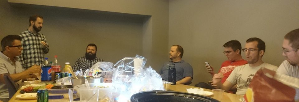image of NEWMEDIA employees enjoying bbq potluck